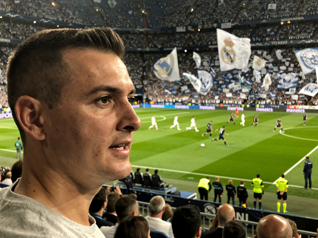 Imagine if: realistic sports broadcast-style image, captured like a candid documentary shot from the spectator stands during